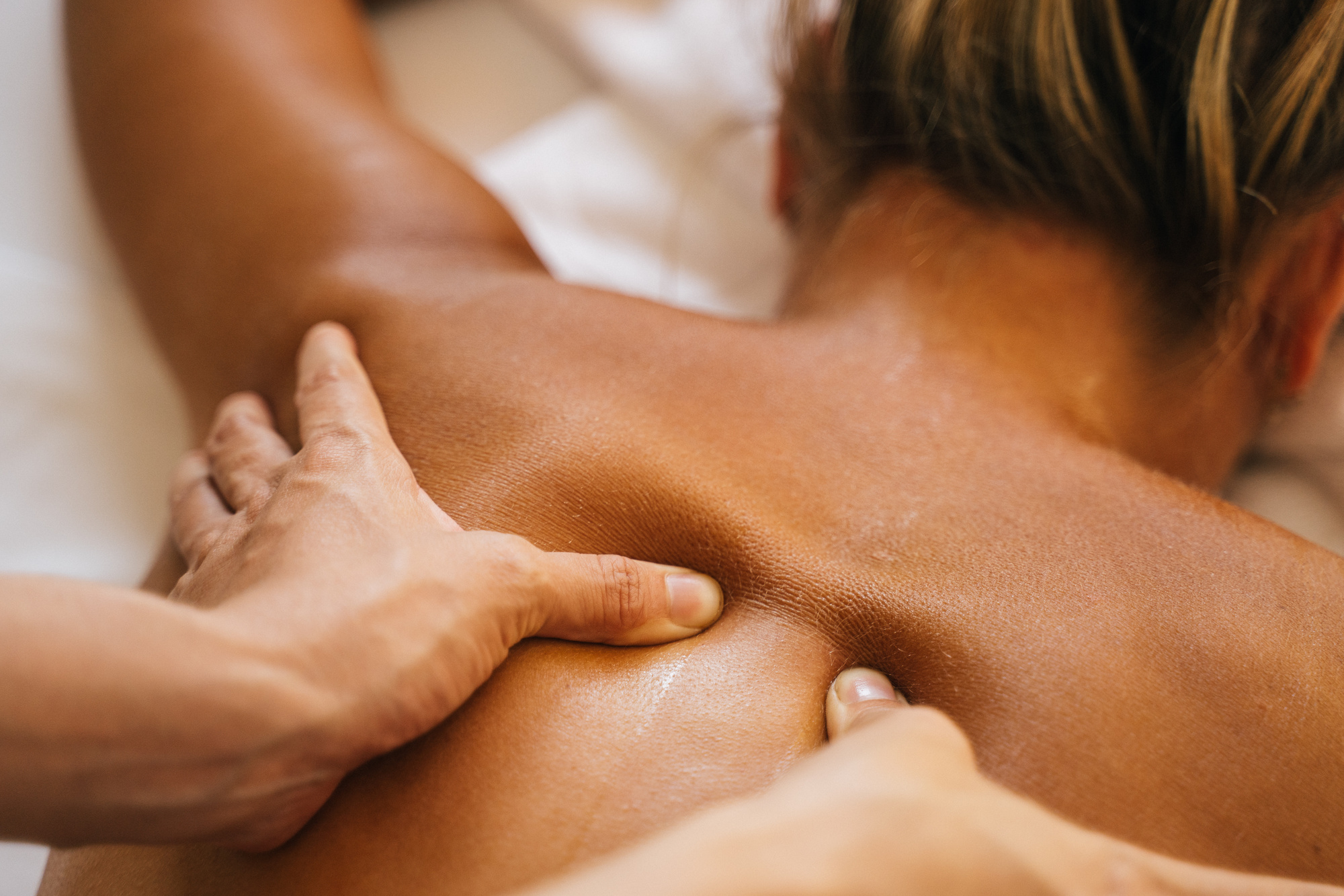 Topless Woman Having a Massage